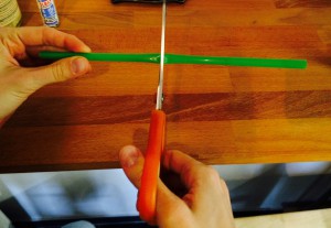 Cut straw into two pieces